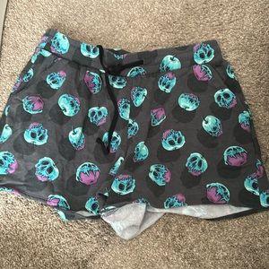 Mickey’s Not so scary villain poison apple all over print shorts